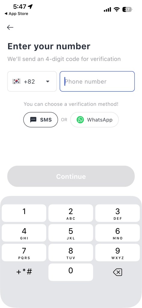 k.ride phone verification screen showing SMS and WhatsApp options