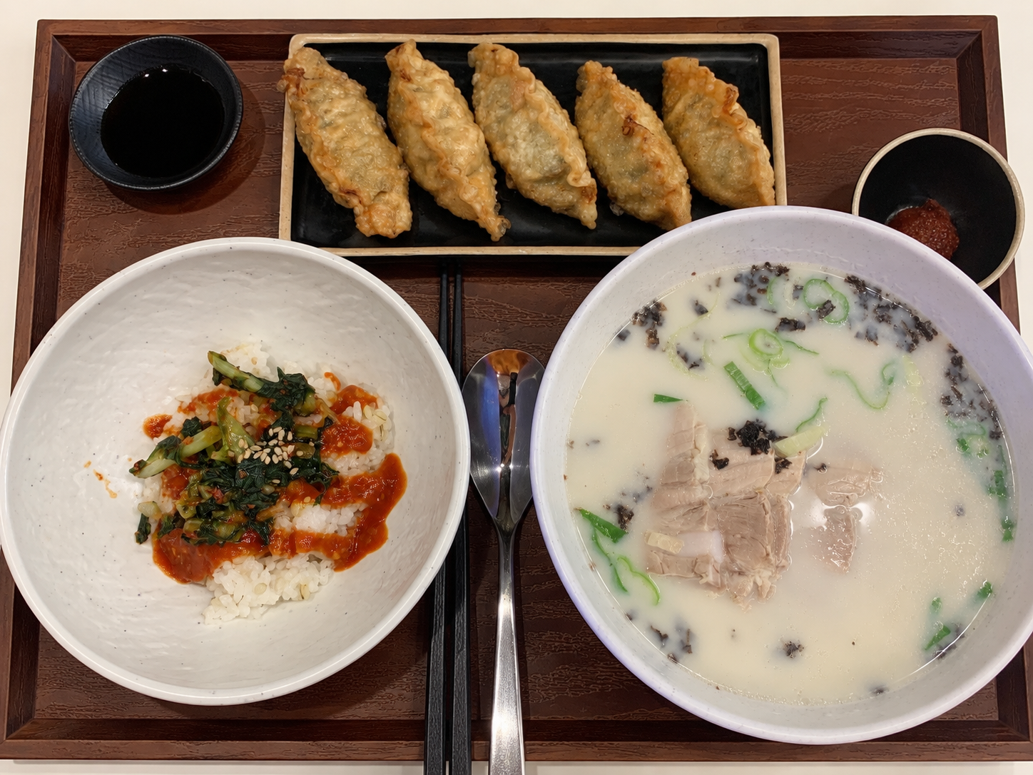 Jeju pork noodle soup with dumplings and rice