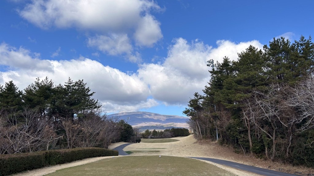 Jeju golf course fairway with Hallasan Mountain in the distance